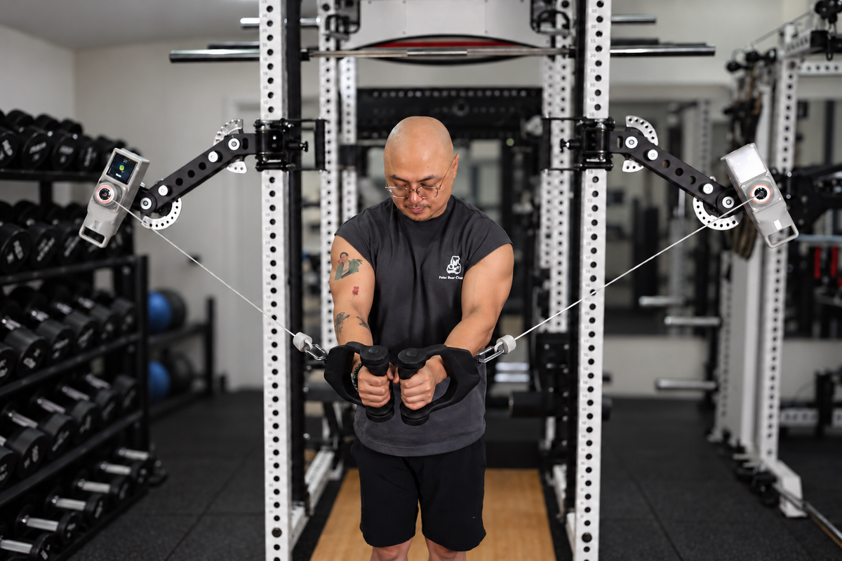 Cable fly demonstration with two Bear Arms; VOLTRA devices, DIY Docks and training handles sold separately.