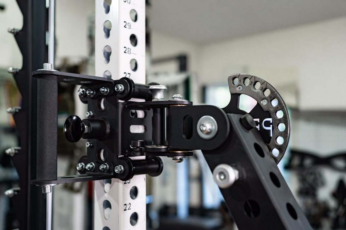 Close-up of Bear Arm's rack carriage, adjustment plate and locking hardware.